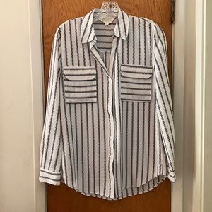 Long sleeved cream colored work blouse